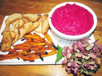 Beet dip with parmesan carrot fries and garlic crostini. Photo by Kay Stephens