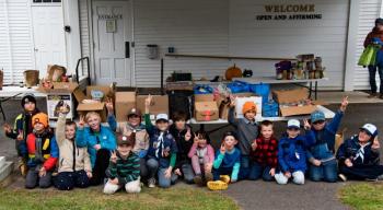 Camden-Rockport Area Cub Scout Pack 200 collected food and clothing for the needy on November 19. (Photo courtesy Chuck Mahaleris)