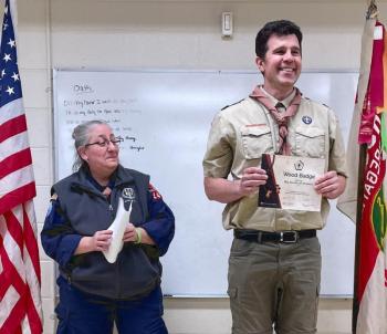 Karen Norton presented Jared Todd with his certificate. (Photo courtesy Chuck Mahaleris)