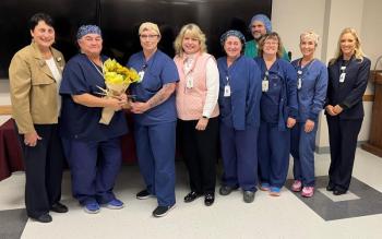 Waldo County General Hospital Perioperative Services Coordinator Sandra Hayes receives the hospital’s Sunshine Award, surrounded by members of her team. Pictured from left: Ellen Leone, MSN,
RN, chief nursing officer; Hayes; Niki Arlen, surgical technologist, Waldo OR; Nancy Akers, Waldo perioperative nurse manager; Tracy Medina, surgical technologist, Waldo OR; Bryan Sirois, certified surgical technologist, Waldo OR (back); Denise Keller, RN, Waldo OR; Vanessa Mckay, clinical care coordinator, Waldo OR; and Denise Needham, PharmD, president. (Photo courtesy Waldo County General Hospital0