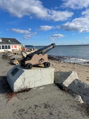 The cannon stands alone at the shore, the benches washed away and destroyed. (Photo by Ed O’Brien)
