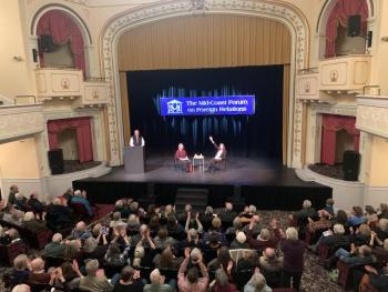 The 489 seats of the Camden Opera House were gone in a flash when the community heard that Heather Cox Richardson would be speaking Feb. 10. Richardson and Moderator Jo Dondis, a member of the Mid-Coast Forum on Foreign Relations, sat on the stage for a little more than an hour, conversing, and then talking with the audience. (Photo by Lynda Clancy)