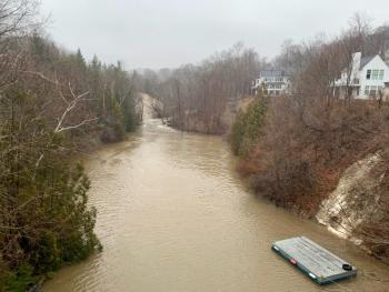 The Goose River, in Rockport, is brown with sediments running off of land, with the 1 to 2 inches of rain falling.