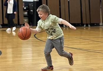 1st grader Azrael Dare hustles down the court. (Photo courtesy Thomaston Grammar School)