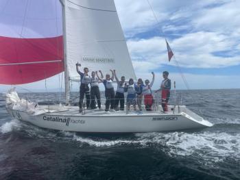 Maine Martiime Academy’s victorious sailors just after winning the Port of LA Harbor Cup in Los Angeles, California, March 10. From left to right: Mastman Aidan Pepperd, Bowman Kyle Carse, Pit Person Courtney King, Skipper Zach York, Jib/Spinnaker Trimmer Ellis Braga, Floater Drake Reid,
Main Trimmer Sarah Evans, Tactician Nala Ho, (Photo courtesy Chris Schreiber)