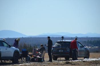 April 8, 2024, eclipse in Benedicta, Maine. People came from everywhere, and their car plates ranged from Texas to Florida to Connecticut, Mass. and Rhode Island. And, of course, Maine. (Photo by Lynda Clancy)