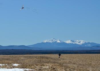 The sunlight slowly edged away as the moon ascended over the face of the powerful sun, while children flew kites. In the distance, Katahdin stood sturdy throughout the eclipse. (Photo by Lynda Clancy)
