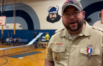 Ira Michaud is not only the Principal at the Vassalboro Community School. He is also an Eagle Scout and the Cubmaster of Damariscotta Pack 213. He welcomed the Cubs from all over the area to Vassalboro. (Photo courtesy Chuck Mahaleris)