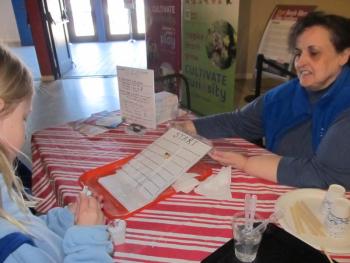 Doing a “snail race” to test the limits of viscosity. Photo by Kay Stephens