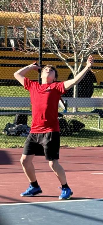 Zach's kick serve (Photo courtesy Gary Spinney)