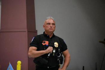 Thomaston Police Chief Tim Hoppe answers questions in 2022 from residents after explaining details of a two-on, five-off work schedule. (Photo by Sarah Thompson)
