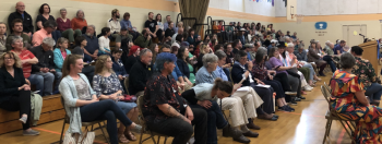 A crowd of supporters and detractors of a policy aimed at protecting transgender and gender expansive students pack the gymnasium at Union Elementary School on May 16 to witness the school board discussion of the proposed deletion of the policy. (Sarah Masters photo)