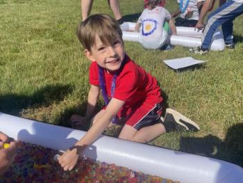 Dresden Fairfield plays in the Orby pool. (Photo courtesy Thomaston Grammar School)