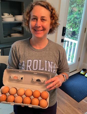 Jennifer from North Carolina with eggs from Common Wealth Farm at the Camden Farmer’s Market