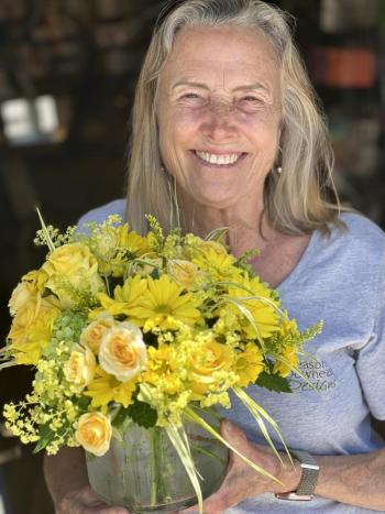 Anna Remsen with bouquet from Seasons Downeast Designs