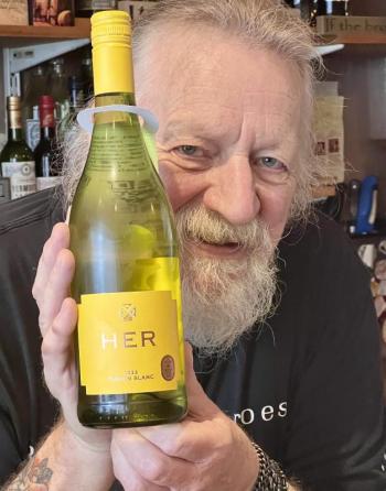 Gary with wine from Lily Lupine & Fern