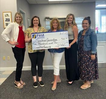 Spectrum Generations employees posed recently with First National Bank team members at the branch in Belfast for a sponsorship check presentation to support programs and the upcoming August 28 grand re-opening event taking place at Spectrum Generations’ Waldo Community Center. Pictured L – R: Michelle Curtis, VP Business Development and Community Engagement Officer, First National Bank; Lindsay MacDonald, VP Community Engagement, Spectrum Generations; Sandra MacDonald, Regional Center Director, Spectrum Generations; Kristen McAlpine, VP Business Development and Corporate Engagement Officer; and Noelle Bruns, Senior Banking Consultant. (Photo courtesy Spectrum Generations)