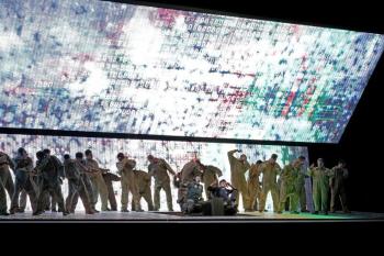Emily D'Angelo as Jess and Kyle Miller as the Sensor in a scene from Jeanine Tesori's "Grounded." (Photo by Ken Howard/Met Opera)