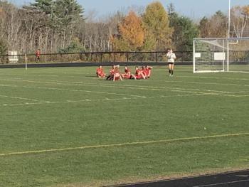 Camden Hills Girls Varsity Soccer Team taking a rest. (Photo by Eric Lear)