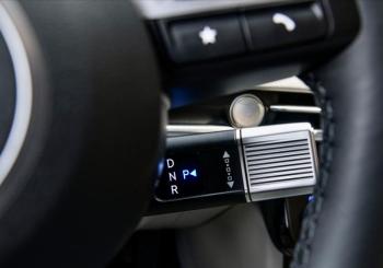 What looks like an oversize control stalk behind the wheel is the Tucson’s new gear selector. Twist the chrome bit toward the front of the car to engage Drive, twist it back the other way for Reverse, and push in on the end of it for Park. It’s surprisingly intuitive, and the e-brake automatically engages at the same time. Tucson car