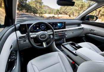 The handsome new-for-‘25 panoramic dashboard is curved toward the driver and features crisp digital displays and intuitive controls. The new center stack below it has real knobs and buttons for manual adjustment of often-used functions, including the audio and HVAC systems. Note also the new storage shelf above the glove box. Tucson car