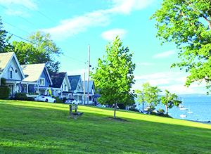 The picturesque gingerbread houses along Park Row Road sit facing the Temple Heights section of Bayside, which remains a popular gathering place. (Photo by Erica Thoms)