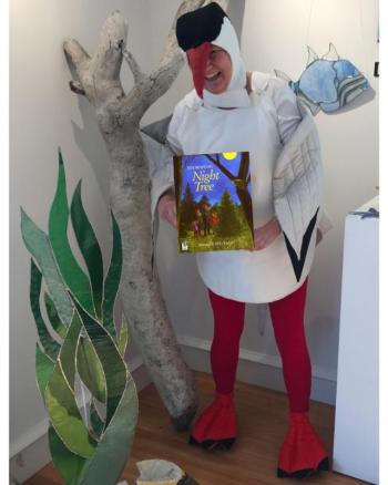 Storytime with Puffin reading Night Tree. (Photo courtesy Maine Coastal Islands Visitor Center)