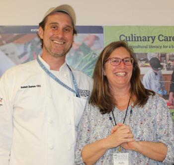 University of Maine Cooperative Extension Educator Kathy Savoie, pictured here with her project partner Rob Dumas, food science innovation coordinator at UMaine, was recently recognized by the National Extension Association for Family and Consumer Sciences with an Innovation in Programming award for the Building Agricultural Literacy through an Immersive Culinary Experiences project. (Photo courtesy University of Maine Extension) University of Maine Cooperative Extension Educator Kathy Savoie, pictured here with her project partner Rob Dumas, food science innovation coordinator at UMaine, was recently recognized by the National Extension Association for Family and Consumer Sciences with an Innovation in Programming award for the Building Agricultural Literacy through an Immersive Culinary Experiences project. (Photo courtesy University of Maine Extension)