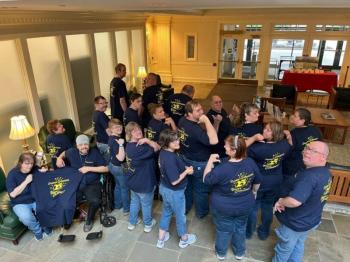 Teammates from Bank of America Belfast Support Services show off their custom 25-year anniversary T-shirts during the celebration at the Belfast financial center in August 2024. (Photo courtesy Bank of America) Teammates from Bank of America Belfast Support Services show off their custom 25-year anniversary T-shirts during the celebration at the Belfast financial center in August 2024. (Photo courtesy Bank of America)