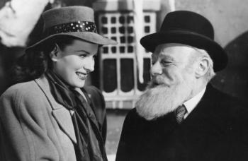 Maureen O’Hara and Edmund Gwenn in a scene from Miracle on 34th Street. (Photo courtesy Strand Theatre)