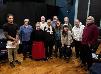 (l-r) Jordan Smith, Wendy Wincote Schweikert, Stephane Natale Frus, Brandon Muggy, Ivy Lobato, Gwyneth Sauvage, Cassidy Small, Alison Trejo (front), Kelly Gubbels, Doug Goodman, and James Reitz. (Photo courtesy Belfast Maskers)