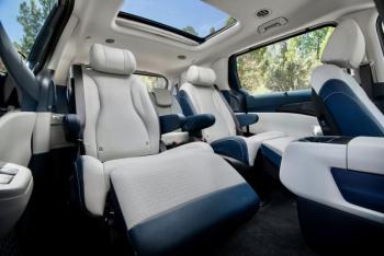Big outside, big inside, and attractively made and finished. But it’s no echo chamber—road noise is minimal. These are the available reclining second-row VIP seats that convert the Carnival from a family car to a company car. Kia Carnival interior