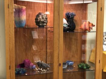 The Nature of Wool by Amy Donaghy (Sarah Masters photo of Amy Donaghy's work) Felted wool sculptures on display at Gibbs Library