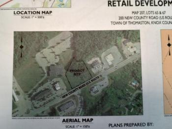 Application paperwork shows the site location.