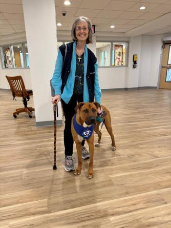 MaineHealth Waldo Hospital’s new pet therapy dog Jamison, with handler Mary Anne Riley, ready to greet patients inside the hospital. (Photo courtesy MaineHealth)