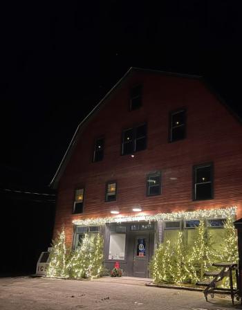 Washington General lit for the season on Dec. 22. (Sarah Masters photo) A shopfront with twinkle lights and undecorated evergreen trees lined up