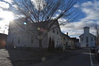 Local developers are proposing to reconstruct a building at 20 Elm Street, and an empty lot next door, into a 12-unit apartment complex. (Photo by Sarah Thompson)