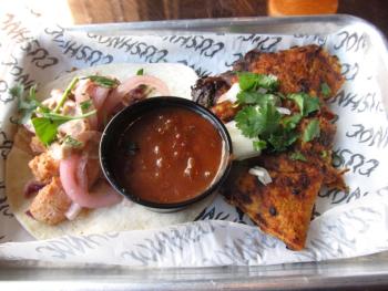 A fish taco and a Beer-ia grilled beef taco. Photo by Kay Stephens