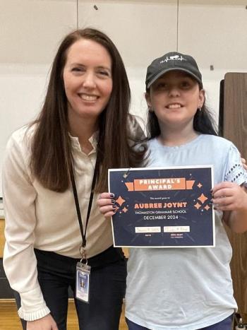 Aubree Joynt receives the Principal’s Award from Principal Ainslee Riley. (Photo courtesy Thomaston Grammar School)
