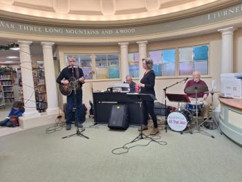 With the frigid temperatures, many folks took a break to get warm and enjoy some fun music inside the Camden Public Library. (Photo by Sarah Shepherd) Photo by Sarah Shepherd