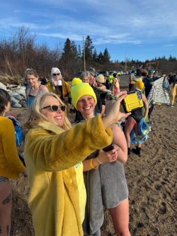 Patrisha McLean, CEO and Founder of Finding Our Voices with Sarah Havener, organizer of the Snow Moon Selkies dip at in 2024 in Brooklin. Havener is rallying dippers from across the Blue Hill Peninsula for this year’s version, 9 a.m. at Naskeag Point. (Photo courtesy Patrisha McLean/Finding Our Voices) Finding our Voices