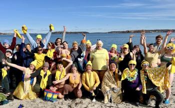 Cold Water Queers, in this photo with Two Maine Mermaids at the 2024 Finding Our Voices dip, will be dipping for Finding Our Voices again February 9, at Willard Beach in South Portland, 11 a.m. (Photo courtesy Mary Kamradt/Finding Our Voices)
Finding our Voices
