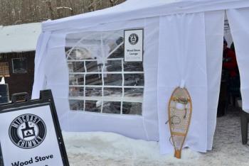 The much appreciated warming tent, courtesy of Midcoast Chimney. (Photo by Lynda Clancy) (Photo by Lynda Clancy)
