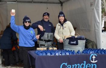 Camden National Bank employees are the loyal cowbell ringers at the toboggan nationals. (Photo by Lynda Clancy) (Photo by Lynda Clancy)