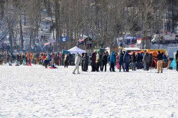 (Photo by Lynda Clancy) Hosmer Pond Maine's flag, Dirigo, Winter 2025. (Photo by Lynda Clancy)