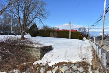 A semi-developed lot at 182 Camden Street, in Rockland, is being eyed as a commercial coffee shop. (Photo by Sarah Thompson)