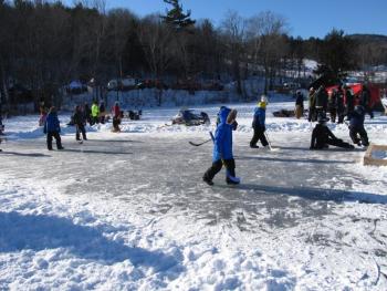 Kids playing hockey Photo by Kay Stephens