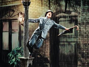 Gene Kelly in a scene from Singin’ in the Rain. (Photo courtesy Strand Theatre)