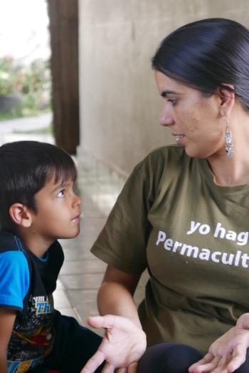Agroecologist Dr. Leidy Casimiro with her son Dario at their permaculture homestead in Medio Cuba. (Photo courtesy Jim Merkel)
Leidy