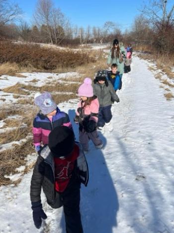 South School students on the move, exploring and learning in the surrounding woods. (Photo courtesy RSU 13 South School)